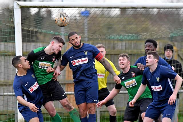 Action from Rugby Town's final game before the enforced coronavirus break, in which they beat Sleaford 2-1 away from home    Picture by Martin Pulley