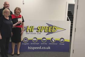 Suzie and Jamie Boazman of Hi Speed Couriers present the cheque to  Kathy Smith, of St Marie's.