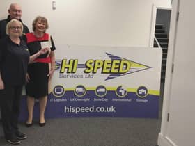 Suzie and Jamie Boazman of Hi Speed Couriers present the cheque to  Kathy Smith, of St Marie's.