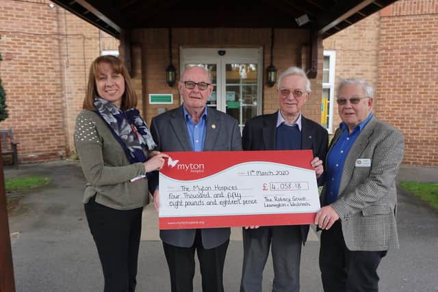 Kathryn Metcalfe, The Myton Hospice's Community Fundraising Support Officer, with the Rotary team Barry Frith, Mike Wilkinson and Barry Andrews at the cheque presentation to the charity for the club's Trees of Light campaign earlier in the year.