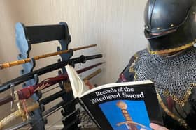 Sir Jay of Warwick reading during lockdown. Photo supplied