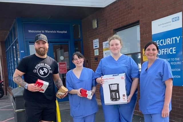Matt from FWX Gyms recently went along to present Warwick Hospital staff with anew coffee machine and beans. Photo supplied