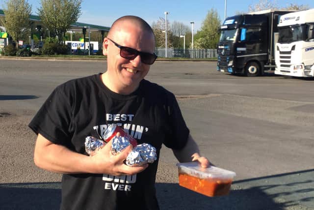 Truck driver Patrick Owens delivers hot meals to other truck drivers across the region.