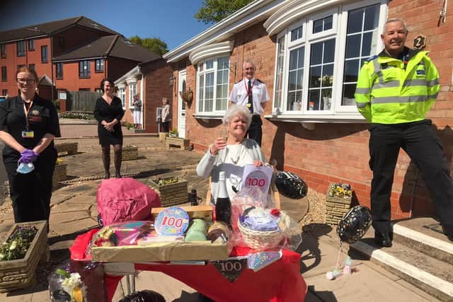 Betty Gutteridge celebrates her 100th birthday thanks to Warwickshire Fire and Rescue Service and Warwickshire Police staff who organised a party for her.