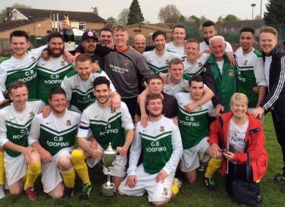 Joy and Jim Barry celebrate with the Leamington Hibs' Division 3 league winning team in 2016. Joy was undergoing chemotherapy at the time.