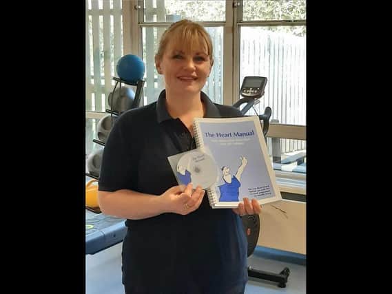 Kirsty Barsby, Clinical Exercise Physiologist UHCW Trust, with one of the Heart Manuals.