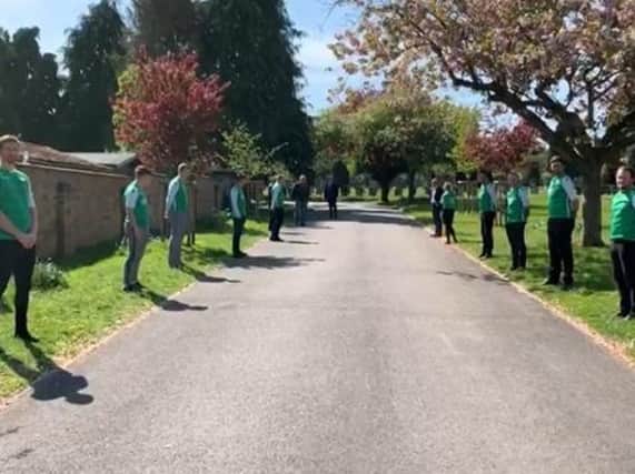 Past and present footballers for Leamington Hibernian FC formed a guard of honour at Leamington Cemetery for the arrival of the funeral procession for the club's co-founder Joy Barry.