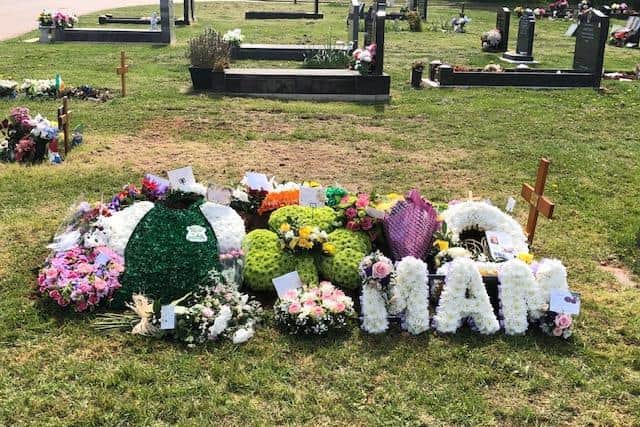 Joy Barry's grave at Leamington Cemetary was decorated with flower arrangements paying tribute to her as the co-founder of Leamington Hibernian FC.
