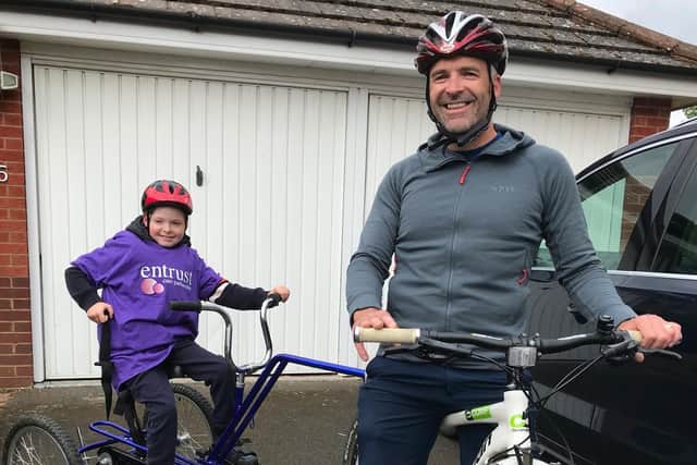 Freddie Mann has been taking on the 26-mile challenge with his Dad Ollie Mann. Photo supplied
