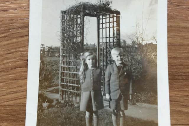Robert Barnes with his sister in their garden in Melton Road during the war. Photo supplied by Robert Barnes.