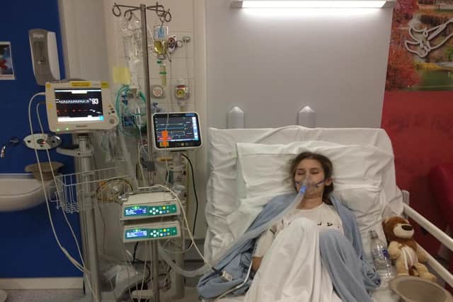 Ella Richards in hospital with Olly The Brave. Photo submitted