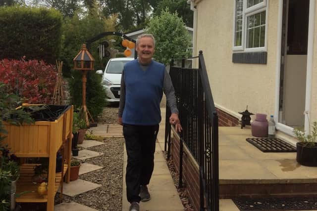 Peter Frazier on one of the many laps around the outside of his house as part of his marathon walking challenge.