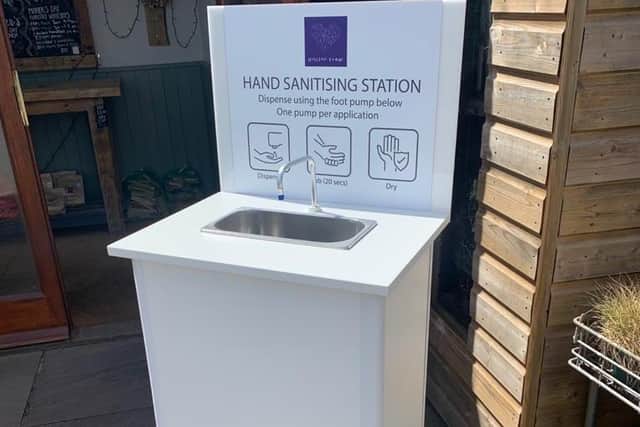 One of the hands-free hand sanitiser stations. Photo supplied