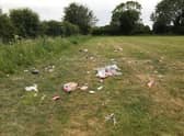 Litter strewn around Newbold Comyn.