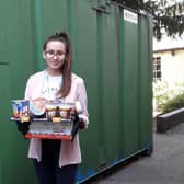 A volunteer at the Trusell Trust receiving the colleges May delivery. Photo submitted