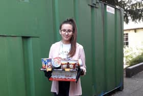 A volunteer at the Trusell Trust receiving the colleges May delivery. Photo submitted