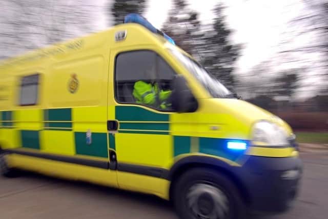A motorcyclist was taken to hospital after a crash in Rugby