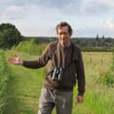 Richard Allanach, stood on a footpath running on the western edge of the proposed development. Photo submitted by Rugby About Turn.