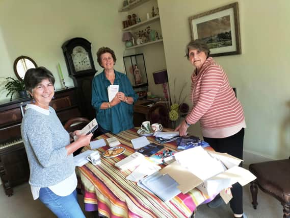 Some of the Steering Group of Warwick District Music Promoters Forum stuffing envelopes in preparation for the mailing out of the Autumn 2021 issue of Music To Your Ears. Photo supplied