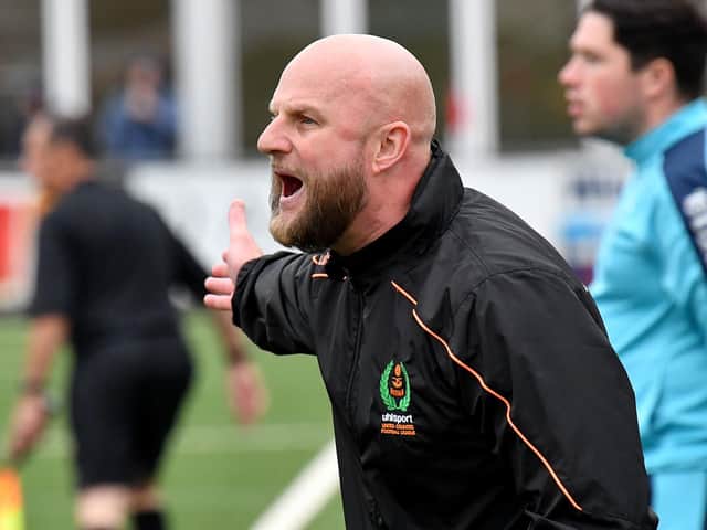 Manager Carl Adams