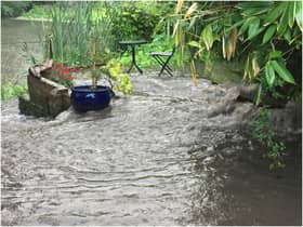 Raw sewage regularly bursts from a drain into a Warwick couple's garden and into the River Avon. Photo by Ben Thompson
