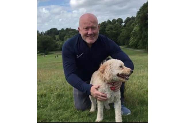 Ian Coop with his dog Herbie. Photo supplied