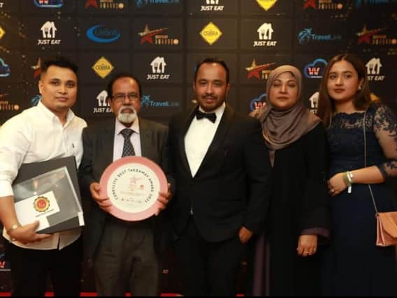 Baabzi Miah with his family at the awards ceremony. Photo by Curry Life Awards