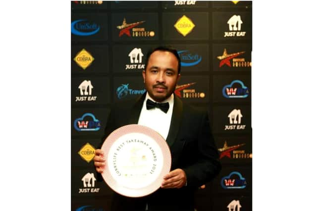 Baabzi Miah with his award. Photo by Curry Life Awards
