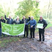 Left to right: Jon Holmes, green spaces development officer at WDC, Karl Curtis, director of reserves and community engagement at Warwickshire Wildlife Trust, Graham Leeke, Friends of Oakley Wood, Alan Rhead,  Neale Murphy, Rod Scott, Friends of Oakley Wood and Adrian Perrett, contract supervisor at idverde. Photo supplied