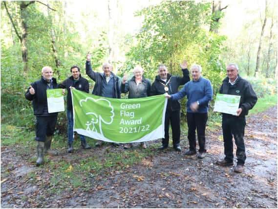 Left to right: Jon Holmes, green spaces development officer at WDC, Karl Curtis, director of reserves and community engagement at Warwickshire Wildlife Trust, Graham Leeke, Friends of Oakley Wood, Alan Rhead,  Neale Murphy, Rod Scott, Friends of Oakley Wood and Adrian Perrett, contract supervisor at idverde. Photo supplied