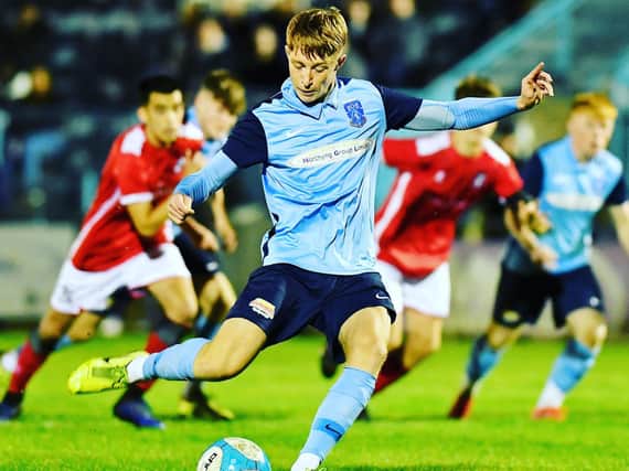 Leo Stone scored a hat-trick to see Rugby Town through to the first round proper of the FA Youth Cup