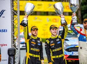 Jon Armstrong (right) and Phil Hall, Junior WRC's 2021 runners-up on podium
