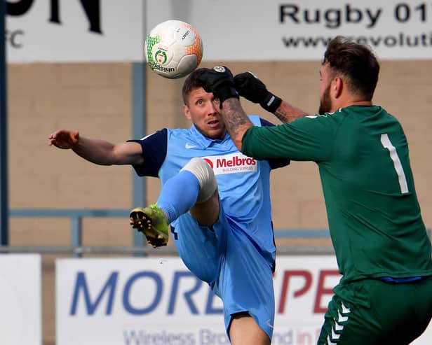 David Kolodynski challenges the keeper