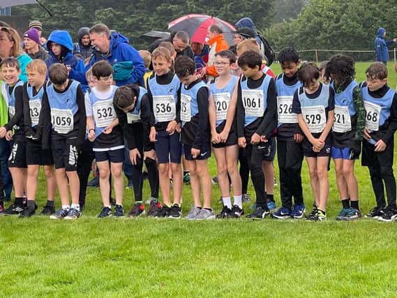 Rugby & Northampton Athletic Club's Under 11s boys on the soggy start line