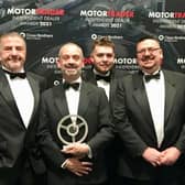 Some of the team from Just Nice Clean Cars in Warwick with the award. Photo supplied