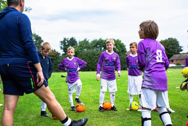 Youngsters at Upper Lighthorne FC have got a new kit for their first season.