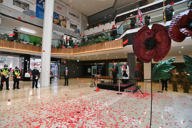The Poppy Appeal 100th Anniversary launch by The Royal British Legion Peterborough Branch with a march from the war memorial to Queensgate EMN-211029-133131009