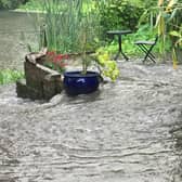 Ben Thompson and his partner Stephanie Holt took this photo of a sewage burst in their garden in Mill Street, Warwick.