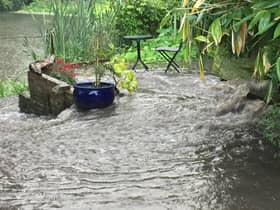 Ben Thompson and his partner Stephanie Holt took this photo of a sewage burst in their garden in Mill Street, Warwick.