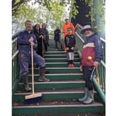 Cllr Jacques with the other members of the community who rallied to help clean the footbridge. Photo supplied