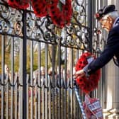 A Rugby veteran lays a wreath at the Memorial Gates during a previous year's ceremony.