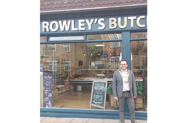 The Mayor of Warwick, Cllr Richard Edgington outside Rowley's Butchers in Warwick. Photo supplied