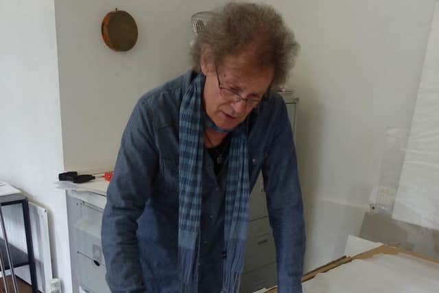 Simon Lewty in his Leamington studio with his work in 2012 (photo by Clare Cooper)