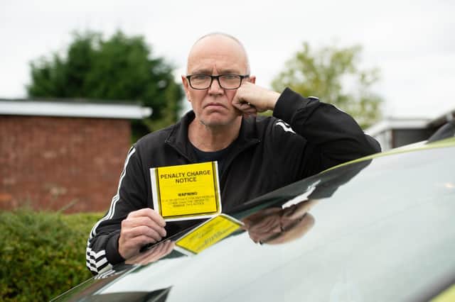 Paul Cronin with his parking ticket.