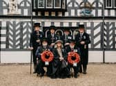 The current Brethren in uniform outside the Lord Leycester Hospital in Warwick.