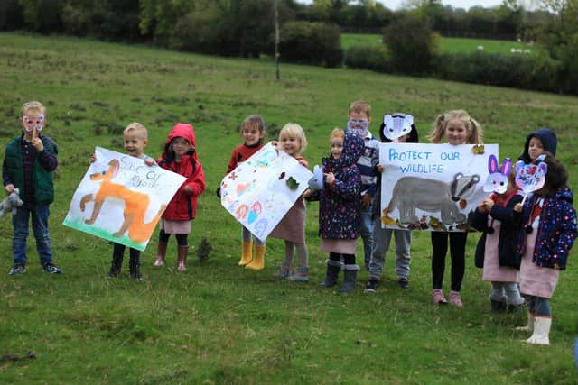 Children show of their creations.