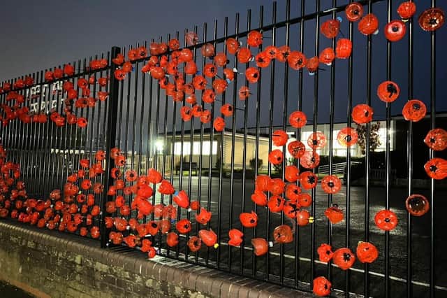 This striking display of poppies on school gates has been put together by Whitnash schoolchildren.