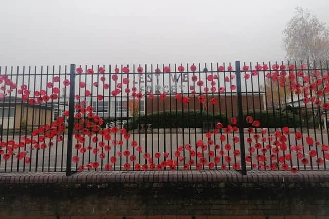 This striking display of poppies on school gates has been put together by Whitnash schoolchildren.