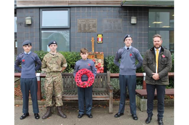 Headteacher Mike Lowdell with four of the school's student cadets.