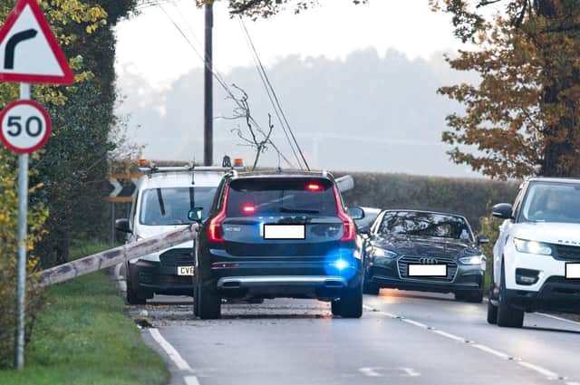 A fallen telegraph pole partially blocked a road near Rugby this afternoon (Monday).
Photo by dh Photo.